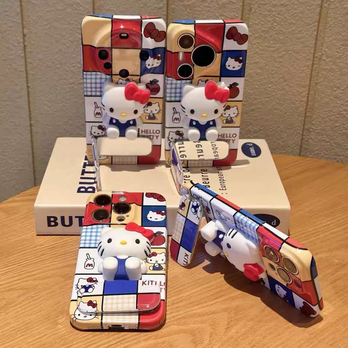 Hello Kitty mirror phone case with a stand and grid pattern