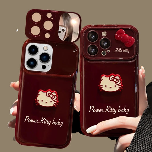 Two red phone cases with Kitty designs held by a person.