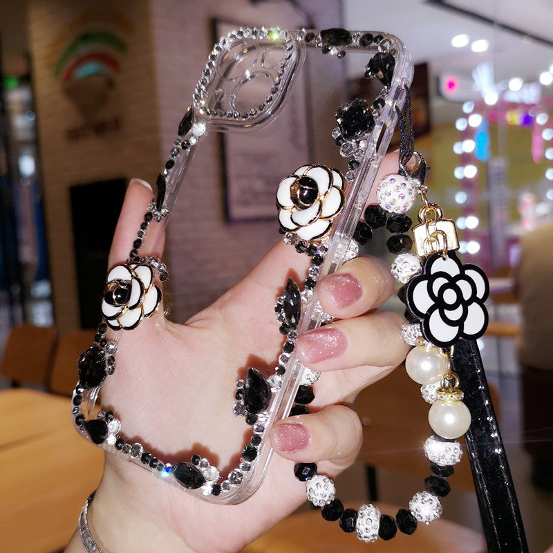 Étui iPhone fait main, minimaliste, à fleurs, diamants et cristaux, avec chaînette à breloque
