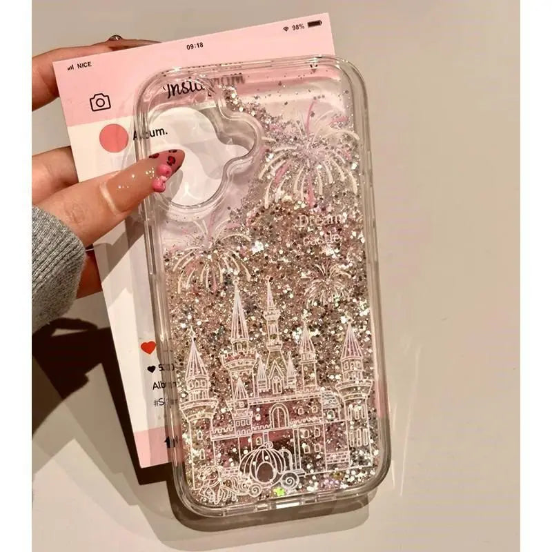 Phone case with castle design and glittery effect held by a hand.