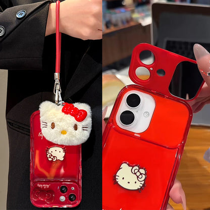Red phone case with Kitty design held by a person, close-up of the case.