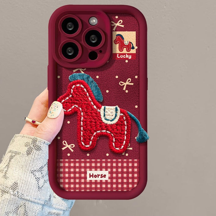Phone case with horse design and 'Horse' branding on a gray background