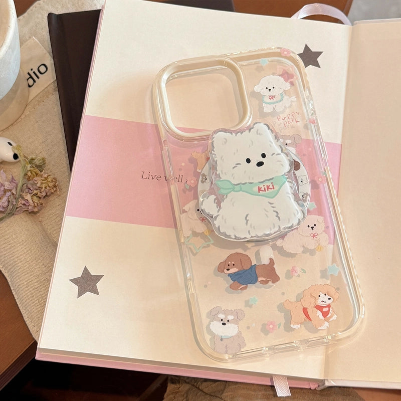 Phone case with cartoon dog designs on a notebook