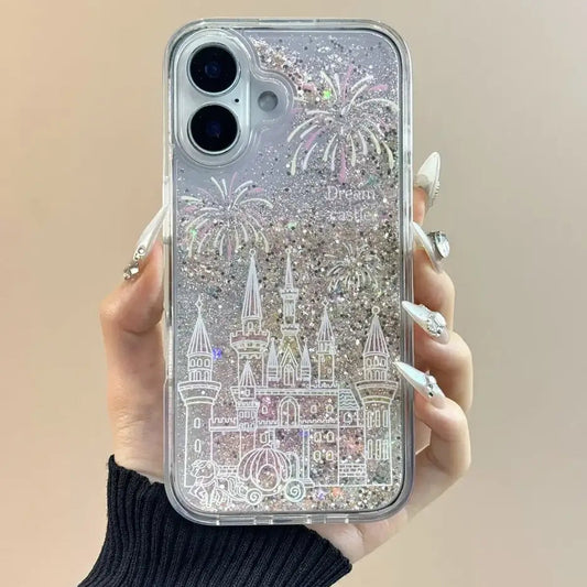 Phone case with castle design and 'Dreams' text held by a hand against a beige background