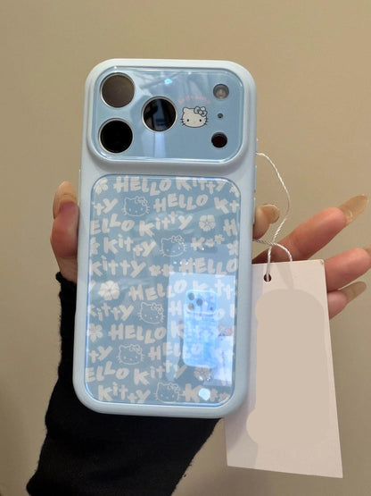 Phone case with 'Hello Kitty' design held by a person, with a tag displaying 'INS HOUSE'.
