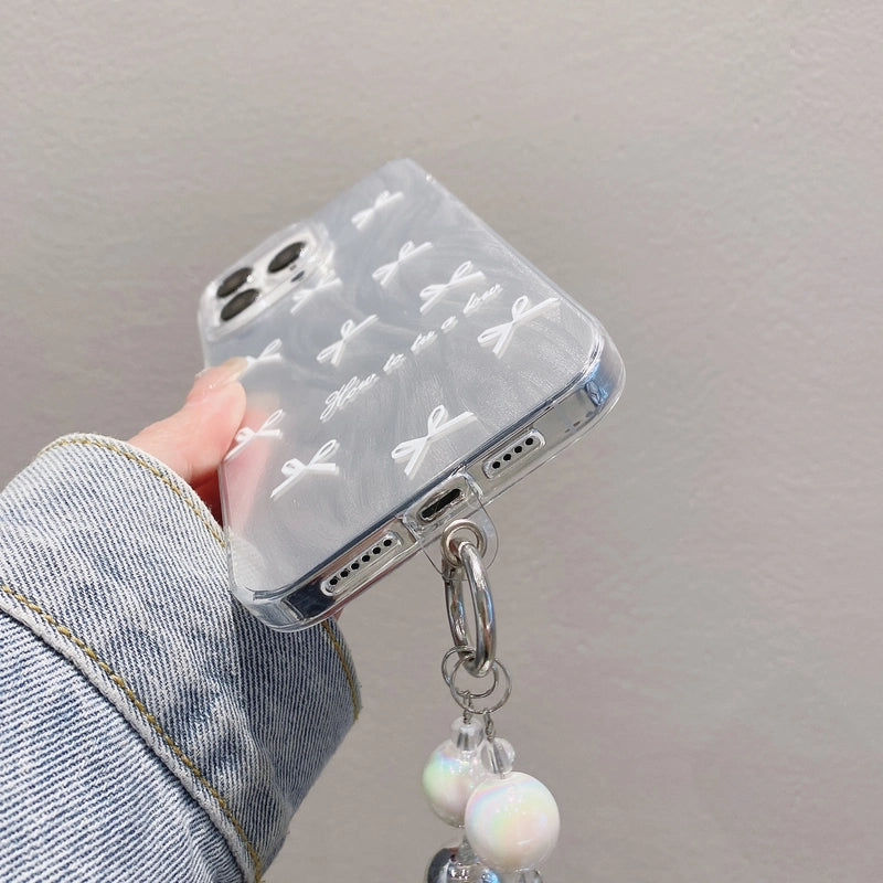 Coque de téléphone IMD avec joli nœud et bracelet pour iPhone 17, 16, 15, 14, 13, 12, 11 Pro Max, X, XR, 7 et 8