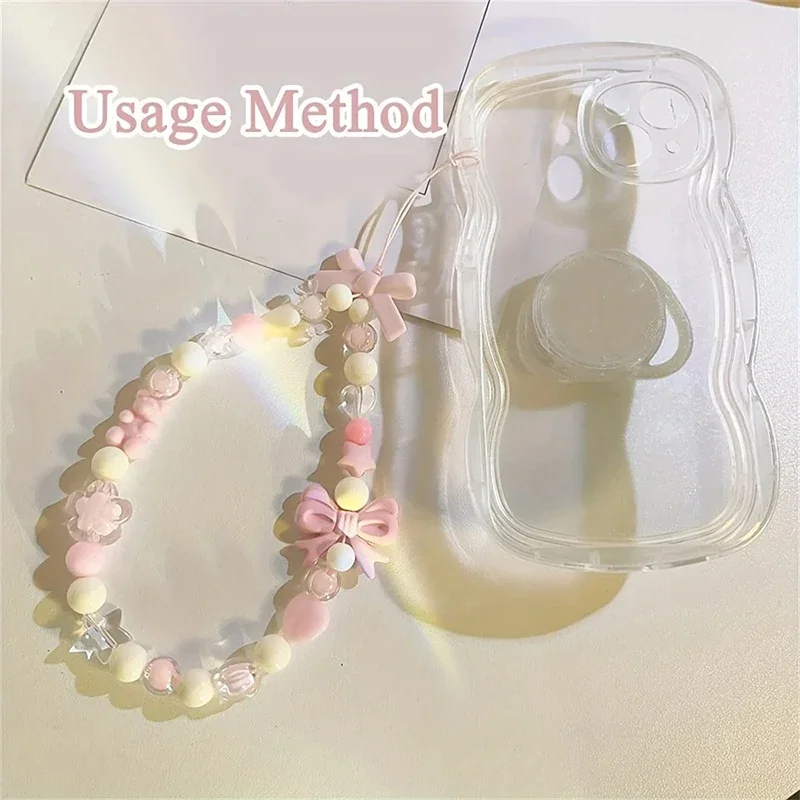 S1e6231e37cd84ac394383c2392107a85j.webp Pink Bowknot Bear Star Flower Cellphone Lanyard Phone Chains For Women Girls Sweet Pearl Phone Charm Strap Anti-lost Accessories