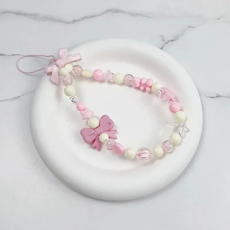 S2b3040fdbd1648fa8c0182d5f3428adb1.webp Pink Bowknot Bear Star Flower Cellphone Lanyard Phone Chains For Women Girls Sweet Pearl Phone Charm Strap Anti-lost Accessories