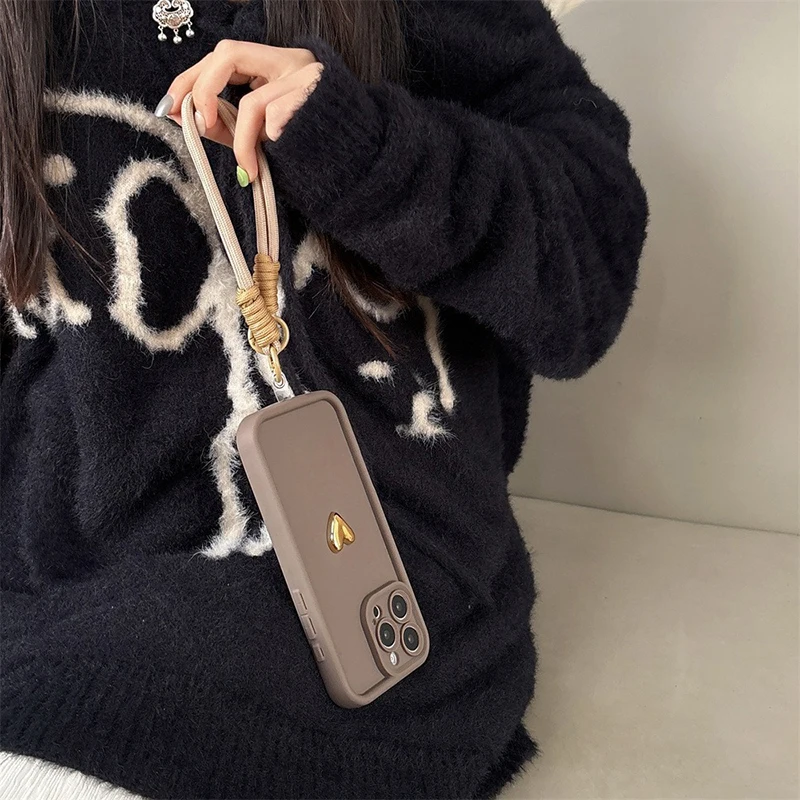 S4ba1535ed360455baf33c33d4506649cr.webp Cute Korean 3D Golden Love Heart Soft Case For iPhone 16 17 Pro Max 15 14 13 12 11 Pro 16E 7 8 Plus Wrist Chain Hang Strap Cover