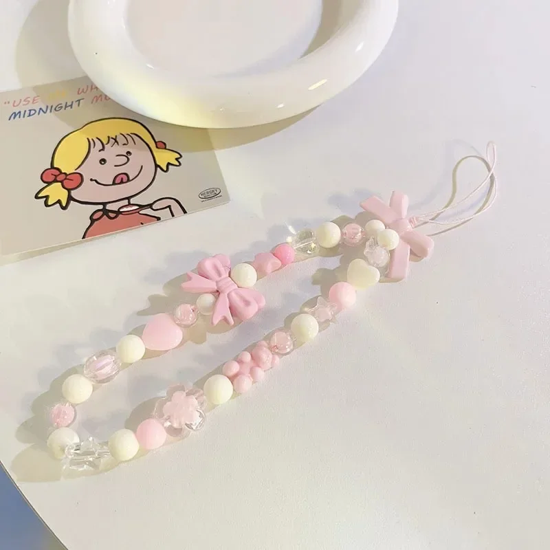 S4f0100db9e1e46ec8b5c9d37a7c75c61G-1.webp Pink Bowknot Bear Star Flower Cellphone Lanyard Phone Chains For Women Girls Sweet Pearl Phone Charm Strap Anti-lost Accessories
