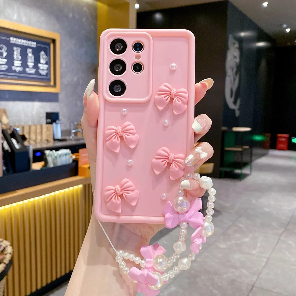 S6f4d3c50dcc24eefbdf40b3f6f261a949.webp 3D Pearl Pink Bow Lanyard Phone Case For Samsung Galaxy S25 S24 Ultra S23 S22 S21 Plus A53 A54 Bracelet Wrist Strap Soft Cover