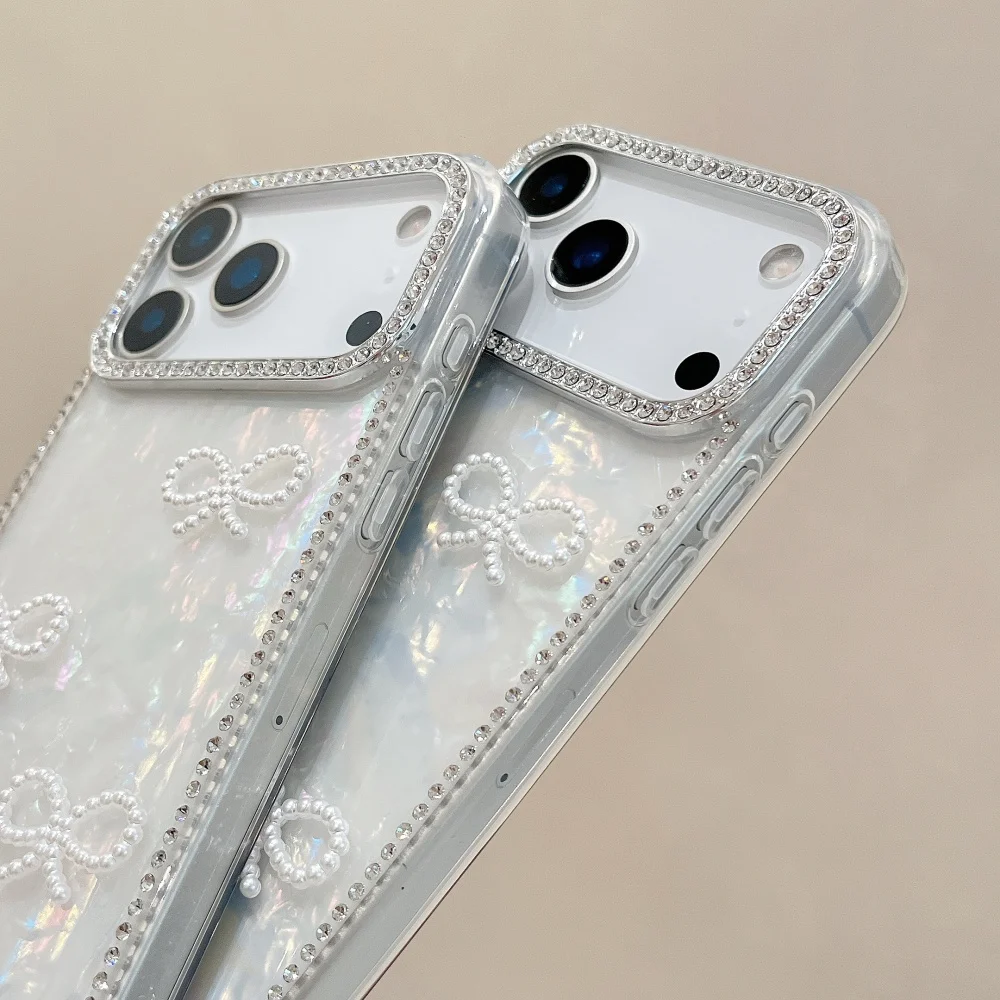 S76ac3147296e440a859048a451c4ffc3E.webp Luxury 3D Pearl Bow Bling Diamond Inlaid Phone Case For iPhone 17 17 Air 17 Pro Max Girly Aurora Laser Acrylic Shockproof Cover