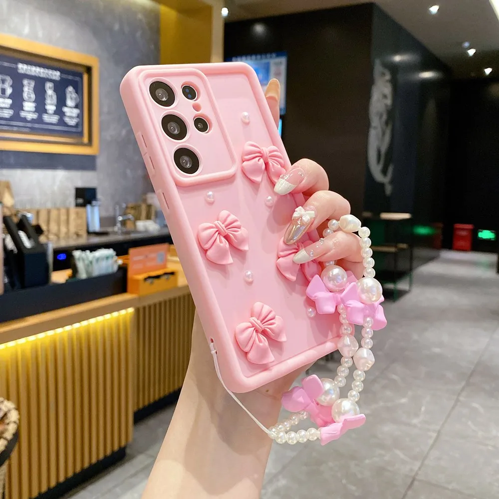 Sae12849e0e924f86b1581e3efe528ae6o.webp 3D Pearl Pink Bow Lanyard Phone Case For Samsung Galaxy S25 S24 Ultra S23 S22 S21 Plus A53 A54 Bracelet Wrist Strap Soft Cover