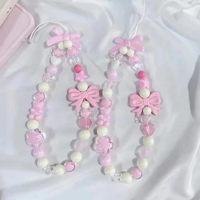 Sd660914fbb5d4900b2904910cd3505ddq.webp Pink Bowknot Bear Star Flower Cellphone Lanyard Phone Chains For Women Girls Sweet Pearl Phone Charm Strap Anti-lost Accessories