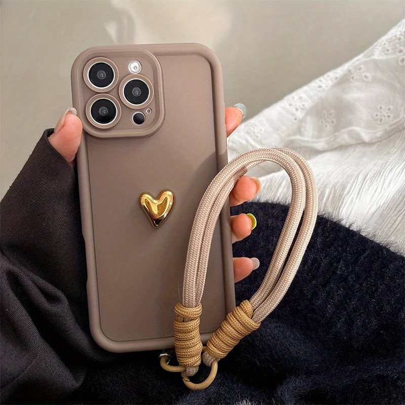 Se5897dd7922d49d284f6d85968e0859dZ.webp Cute Korean 3D Golden Love Heart Soft Case For iPhone 16 17 Pro Max 15 14 13 12 11 Pro 16E 7 8 Plus Wrist Chain Hang Strap Cover
