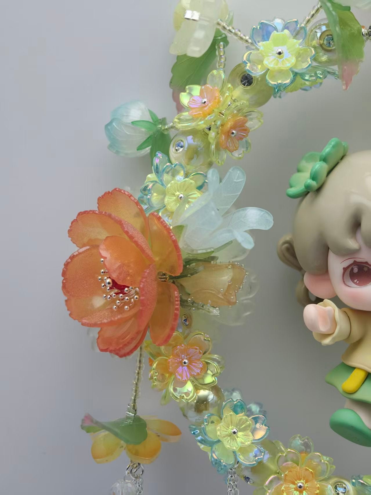 a5fcd1eb01b1b65f11b8a44860ebe159_0fdcbee1-b799-4139-ae25-9cce47aba714.jpg Handmade Yellow Floral Wreath Charm with Cute Girl Figurine