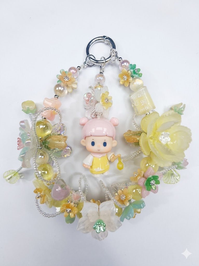 f935fd691910dd970d06439d8314a7ba.jpg Handmade Yellow Pink Floral Doll Charm | Kawaii Bag Keychain Car Mirror Pendant
